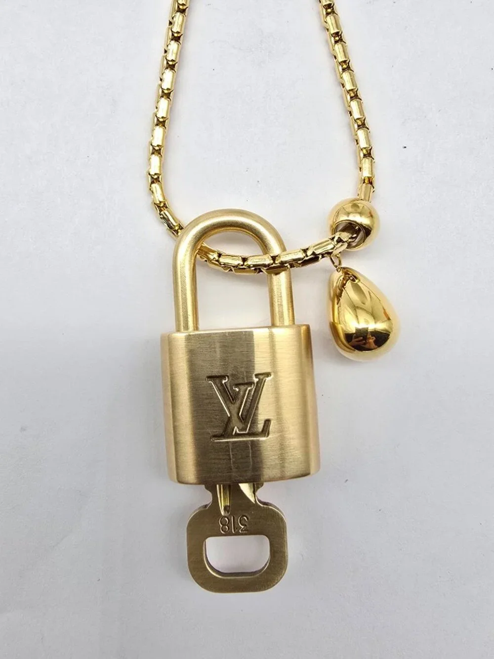 ✨ Stainless Steel Gold-Plated Necklace with Authentic Louis Vuitton Padlock ✨